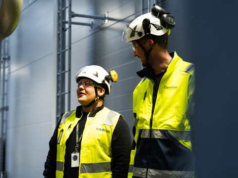 Two technicians in a data centre
