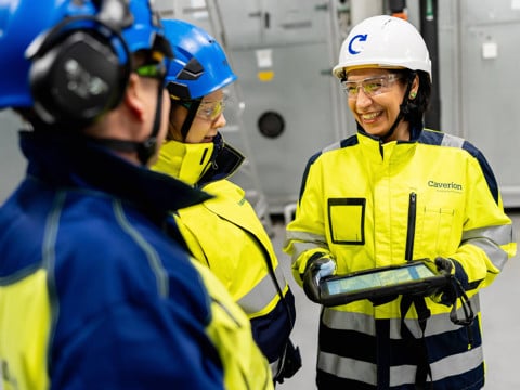 Four technicians pictured from behind